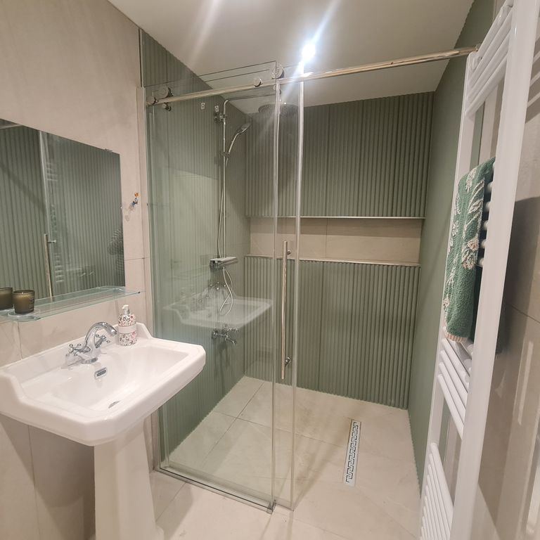 Completed Cardiff wet room shower area by 1st Call Property Solutions